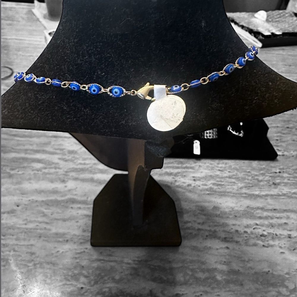 Elegant gold tone and blue evil eye necklace. - Picture 2 of 4